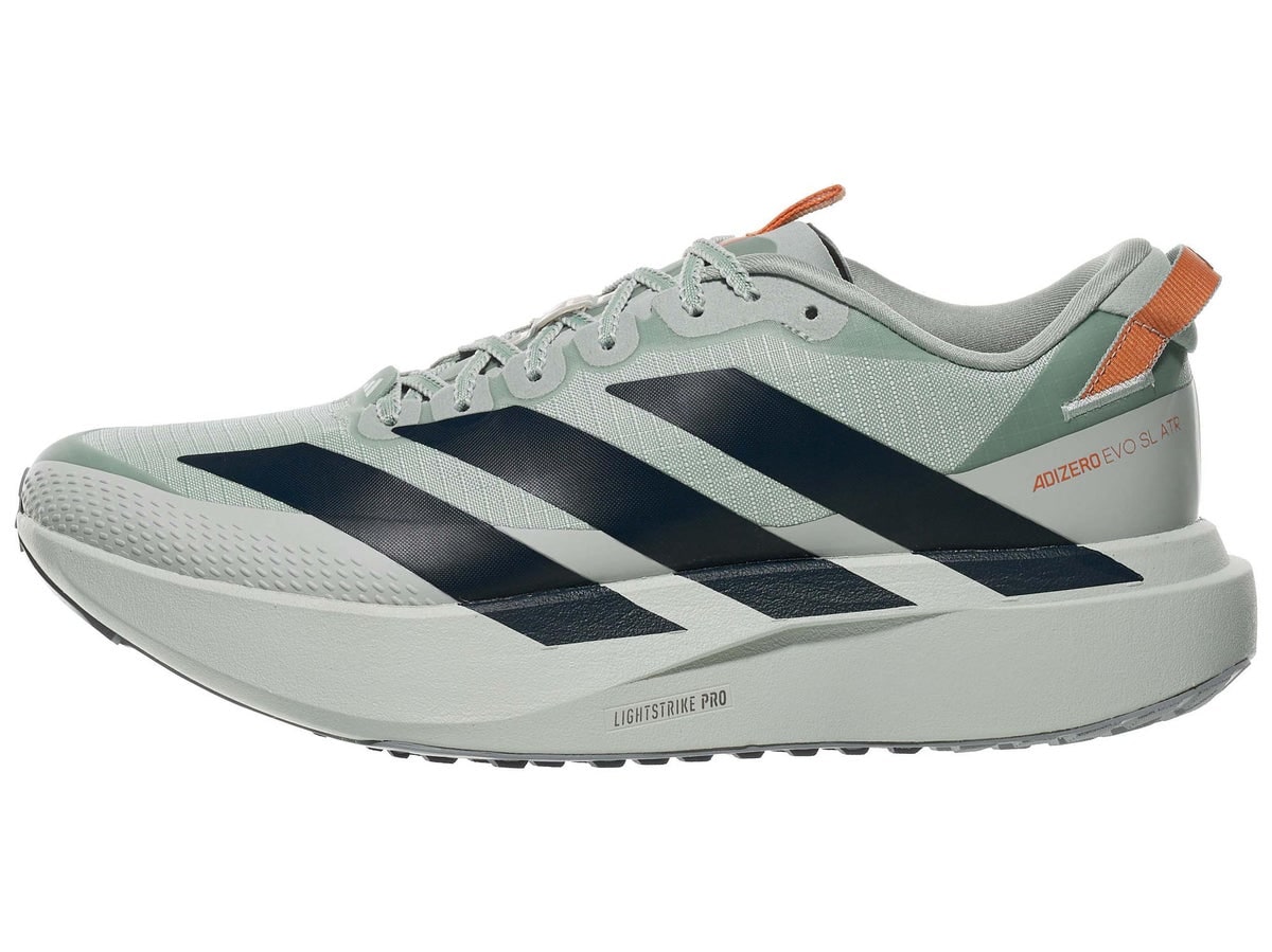 Side profile of a pale green Adidas Adizero Evo SL ATR with black stripes and orange heel details