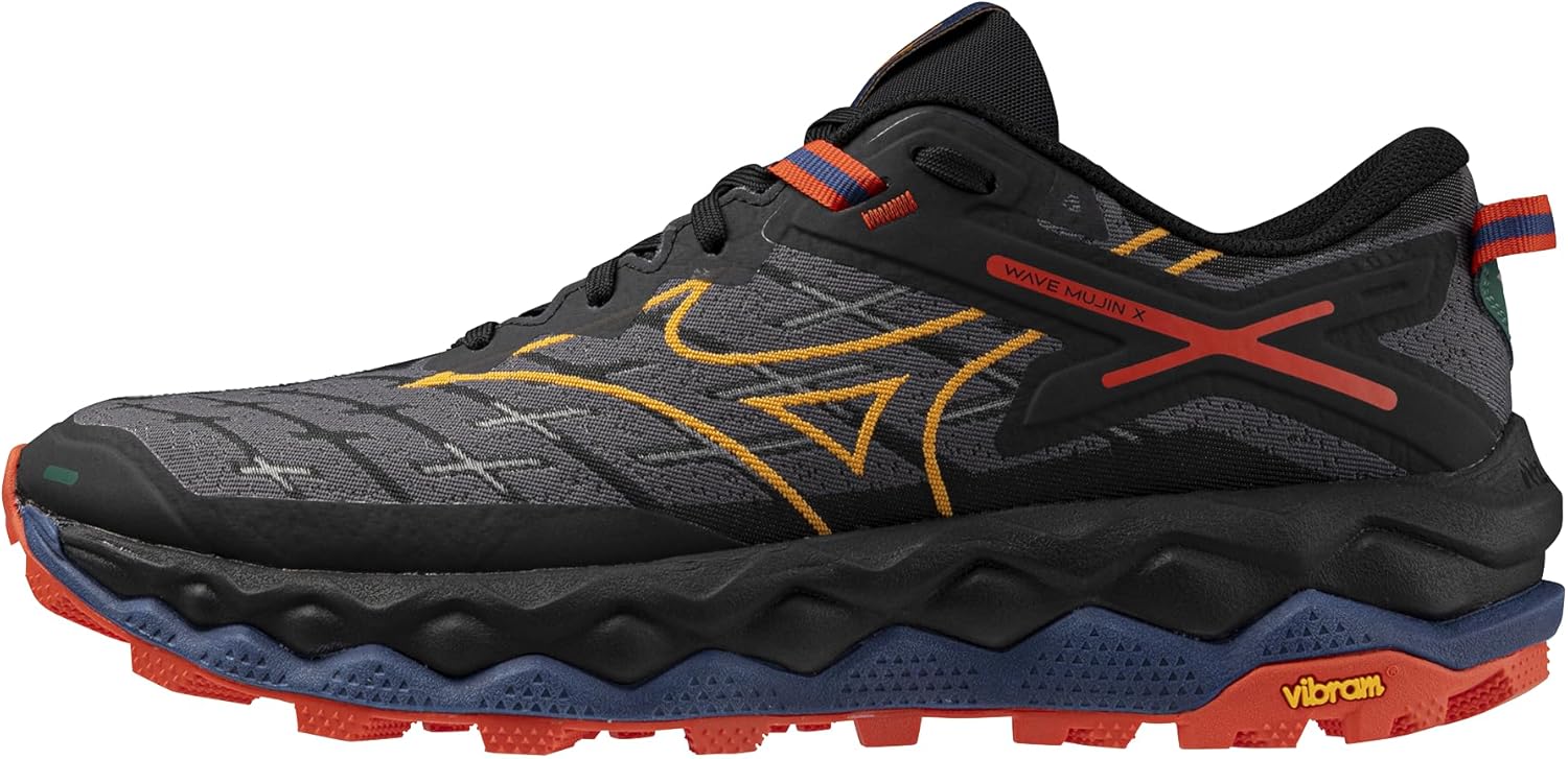 Dark gray Mizuno Wave Mujin 10 trail shoe with yellow stitching and a multicolor lugged outsole