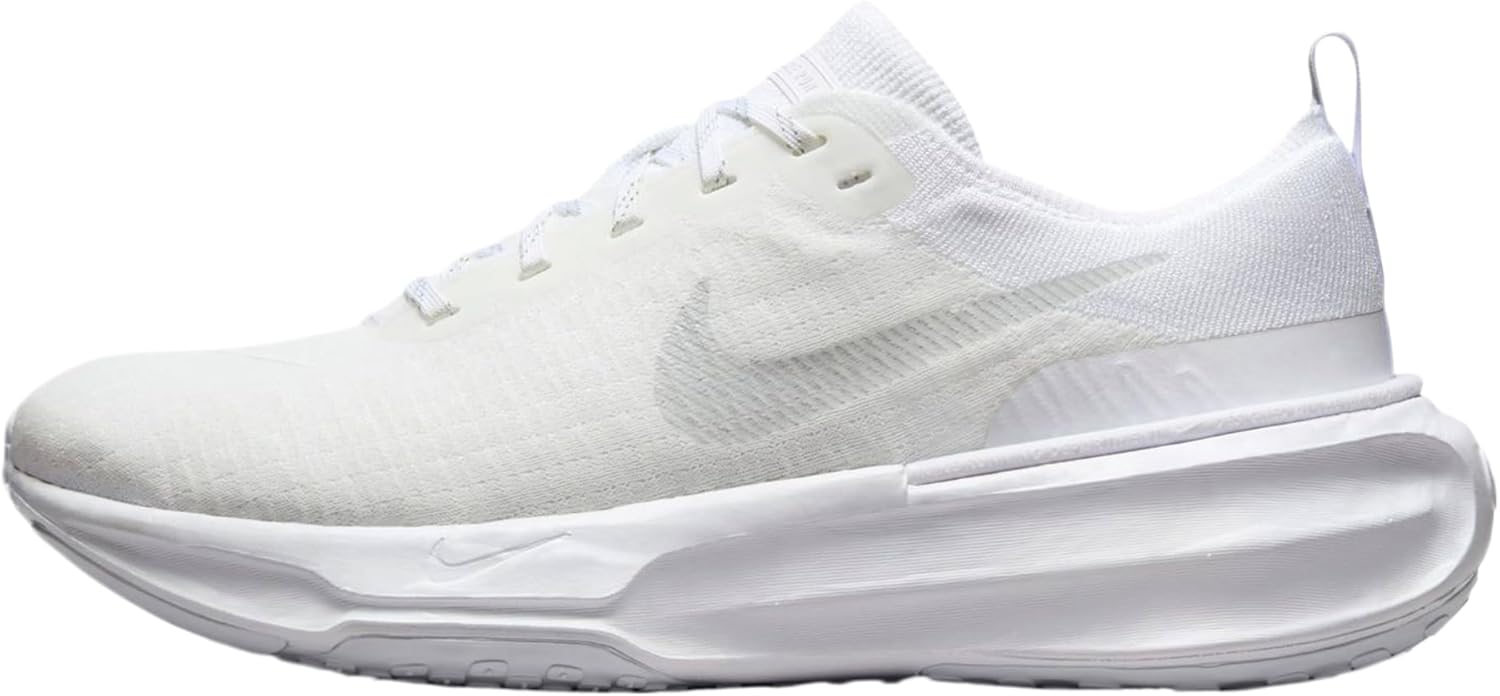 Nike Invincible 3 max-cushion road running shoe shown from the lateral side with a wide ZoomX midsole