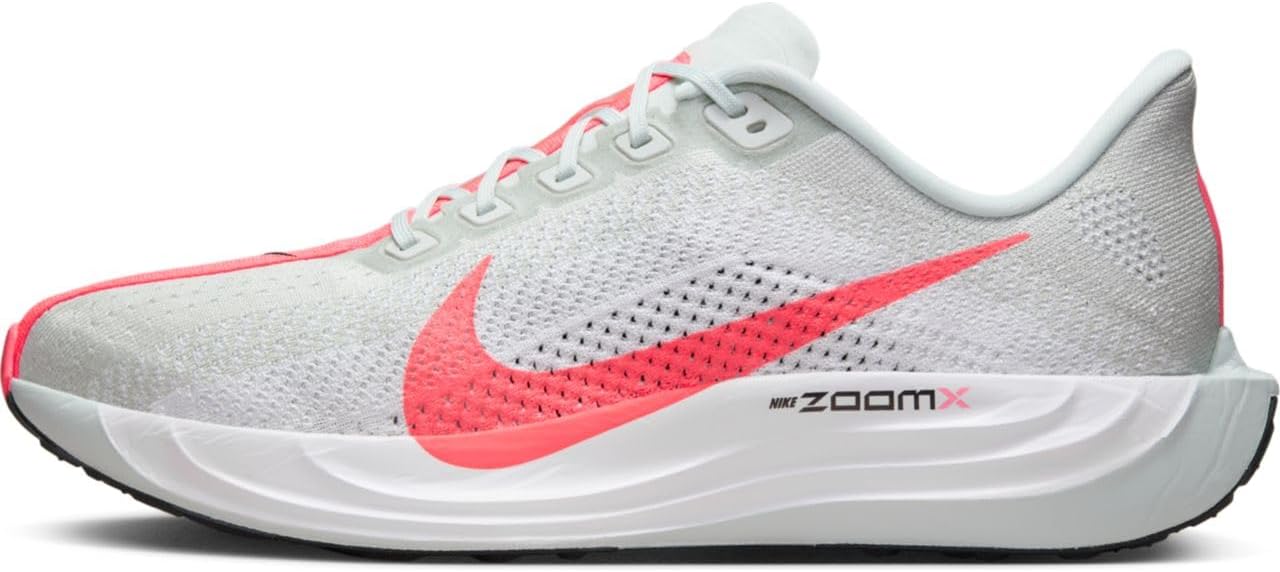 Nike Pegasus Plus road running shoe shown from the lateral side with a striped Flyknit upper