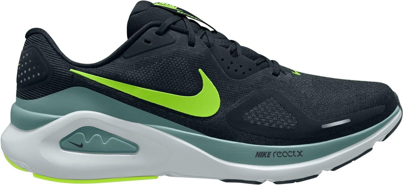 White Nike Structure 26 road running shoe shown from the lateral side