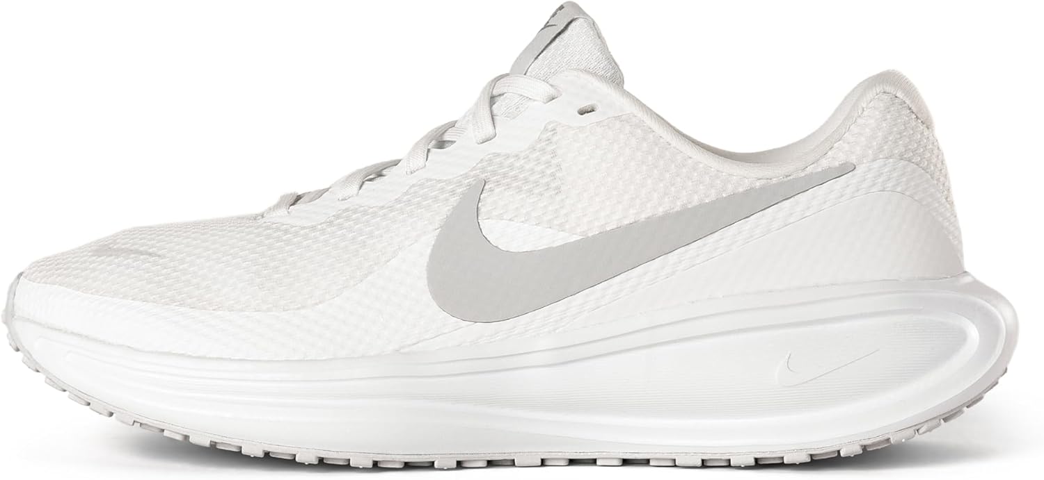 Nike Vomero Premium road running shoe shown from the lateral side with a very tall ZoomX midsole