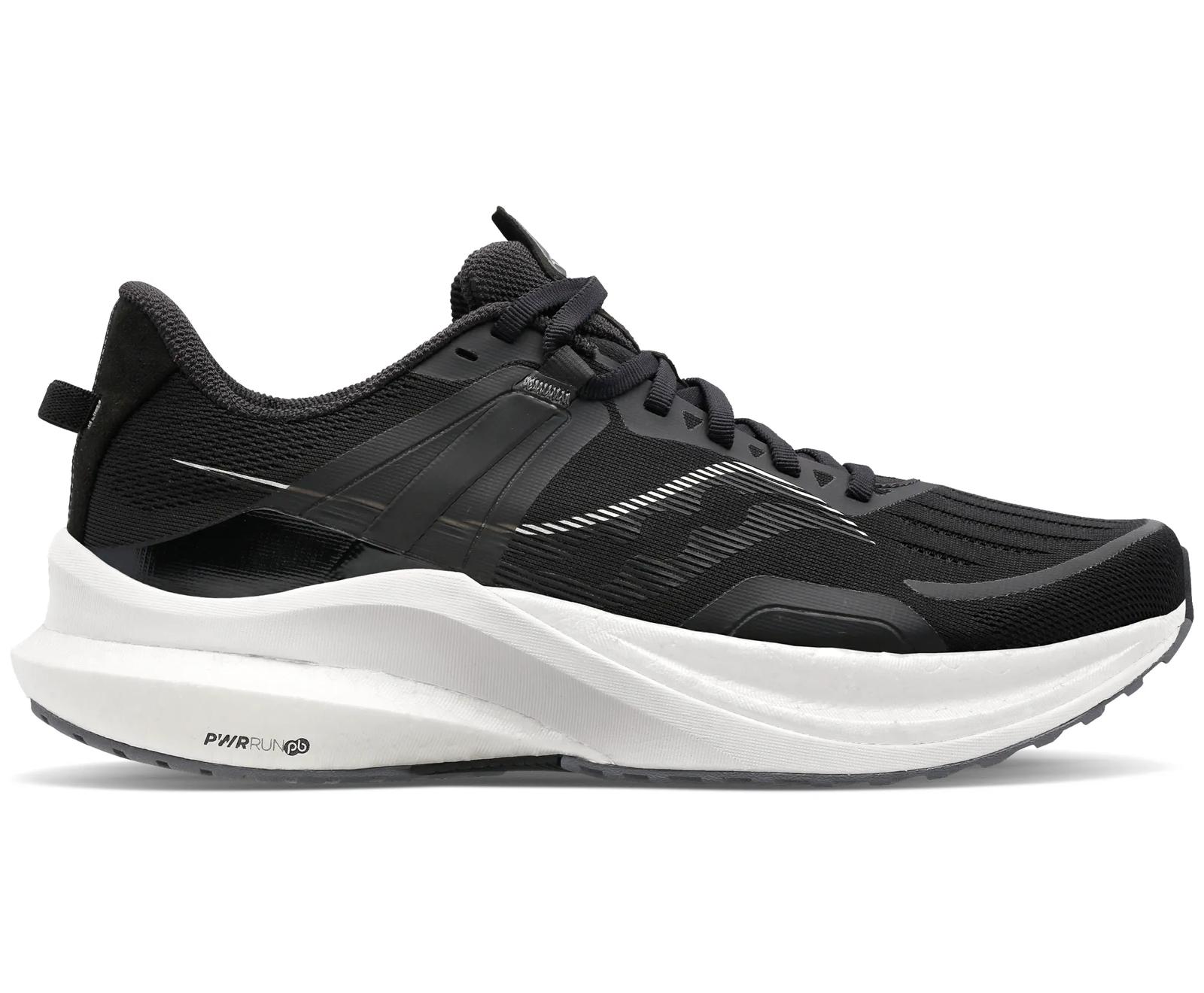 Black Saucony Tempus road running shoe with a white sculpted midsole, shown in lateral profile